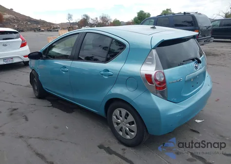 2014 Toyota Prius C One z USA, uszkodzony, nr VIN JTDKDTB30E1070802